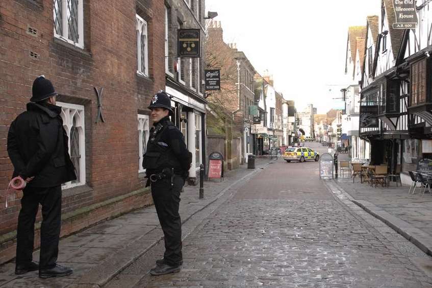 Officers guard the bomb scare scene in Canterbury. Picture: Chris Davey