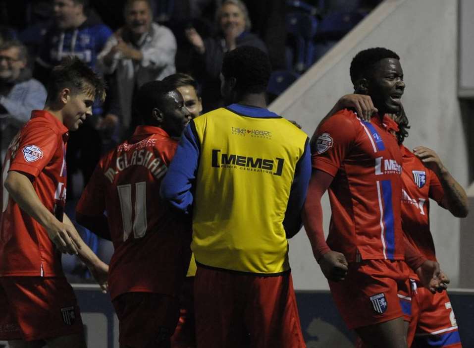 Antonio German celebrates scoring the third Gillingham goal in normal time Picture: Barry Goodwin