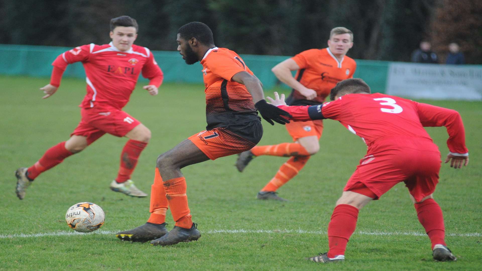 Lordswood's Helge Orome is tracked by Hollands & Blair's Lewis Taylor. Picture: Steve Crispe