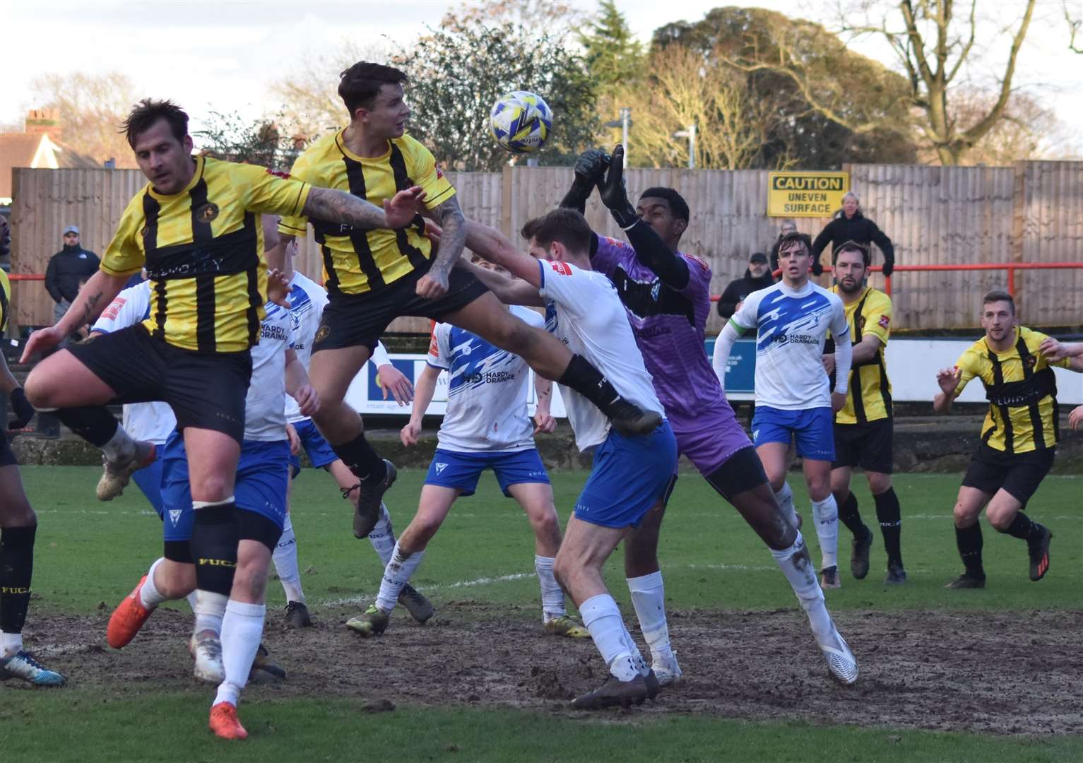 Harrison Pont sees his header punched clear during Herne Bay's 1-1 draw at Erith & Belvedere. Picture: Alan Coomes