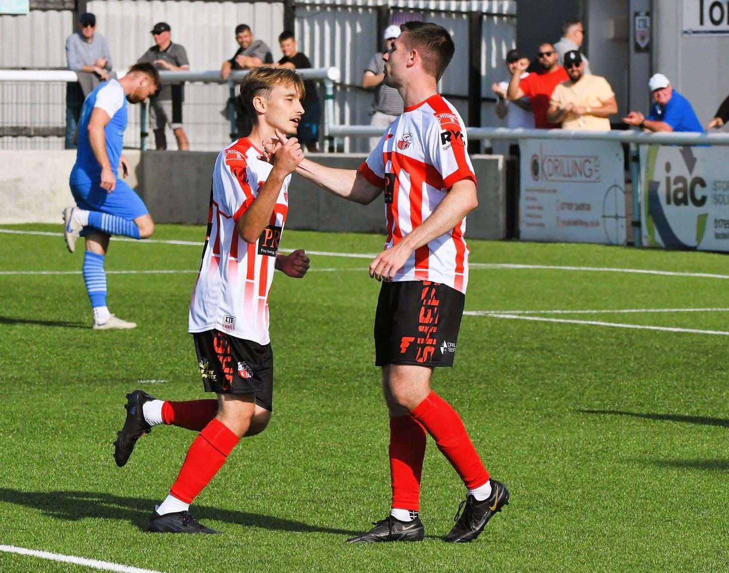 Two-goal Jacob Lambert is congratulated by team-mate and fellow scorer Danny Leonard in Sheppey’s 3-1 FA Cup home win over Kennington on Saturday. Picture: Marc Richards