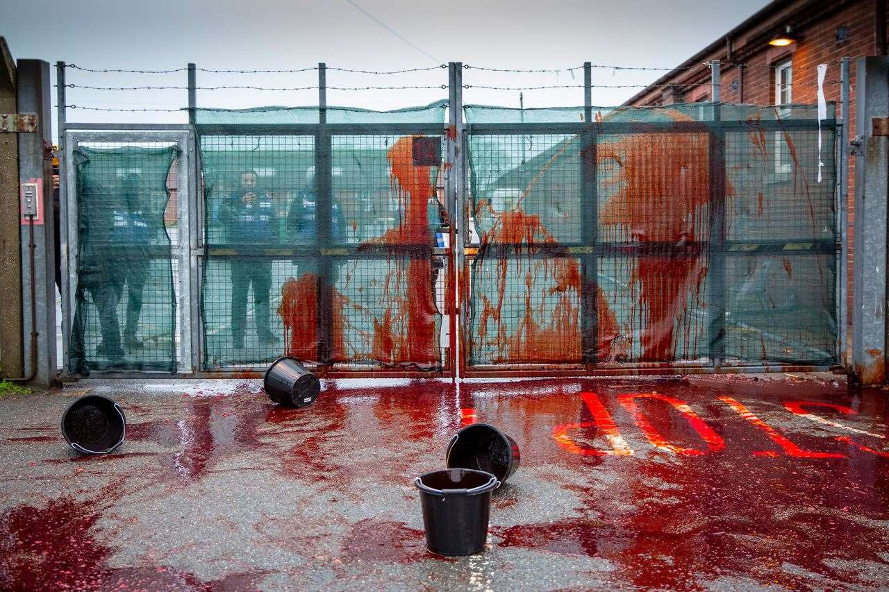 Fake blood was thrown at the gates of the site by protesters calling for it to be closed. Photo:Andrew Aitchison