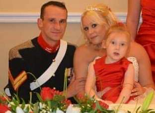 Liam and Sarah Burgin with Ella on their wedding day