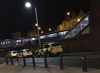 Police vehicles outside Gillingham station