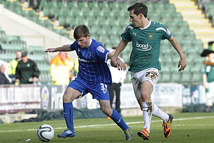 Ashley Miller in action for Gillingham against Plymouth Picture: Barry Goodwin