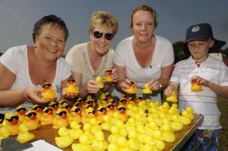 Marie Twyman, Maureen Watson, Sharon Knowler and Joel Hammond selling entries for the duck race at the resurrected Chartham fete. Picture: Chris Davey