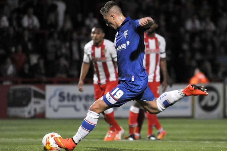 Luke Norris scores from the spot as Gills beat Stevenage on Tuesday Picture: Barry Goodwin