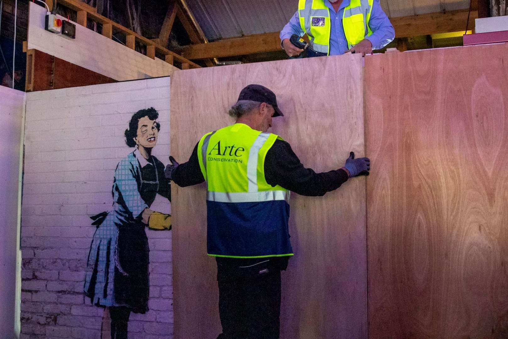 Banksy's piece being assembled at Dreamland in Margate