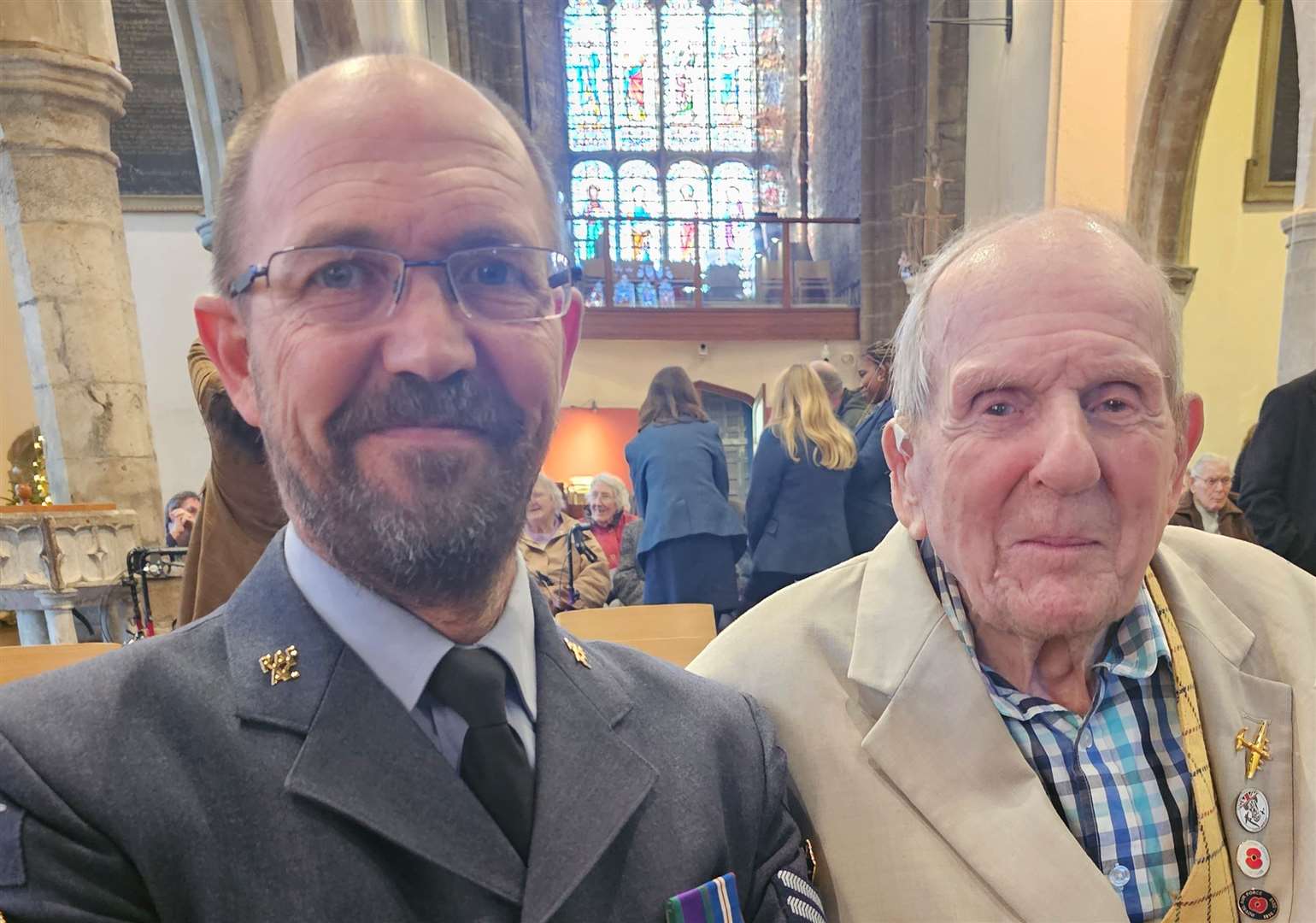Colin celebrating his 100th birthday, pictured with Flight Sergeant Arron Spice