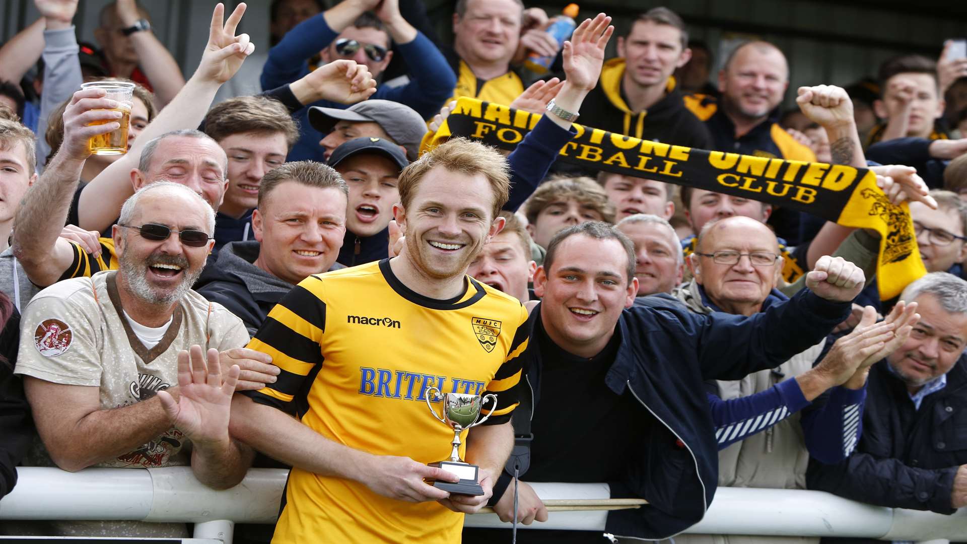 Supporters' player-of-the-year Stuart Lewis with Stones fans Picture: Andy Jones