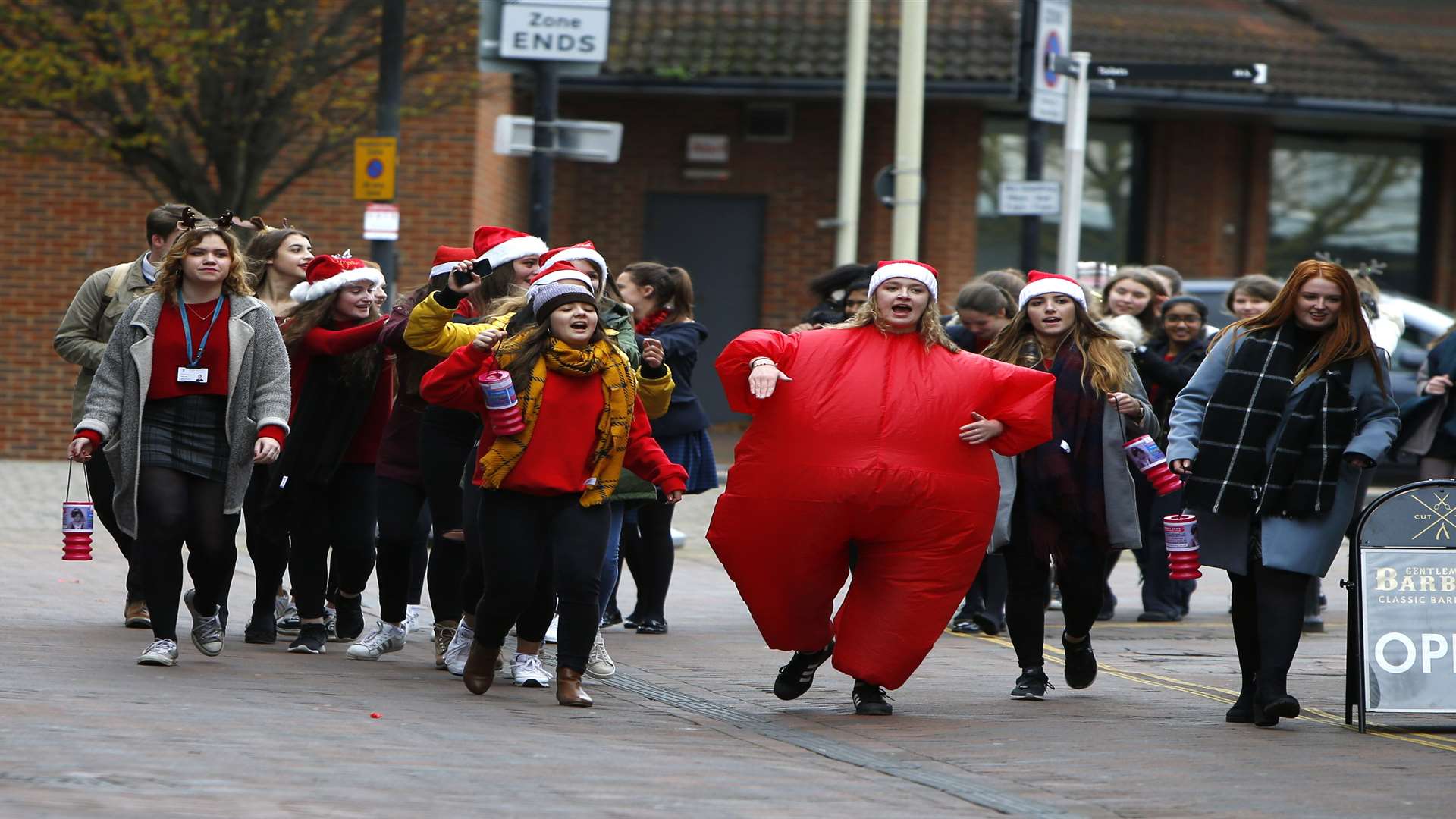 Pupils from Highworth Grammar School doing a sponsored conga from the school to the High Street.