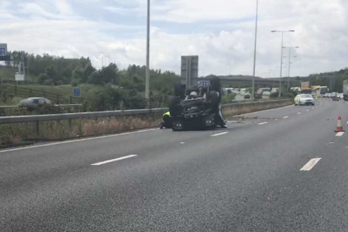 The overturned Land Rover on the M20 at Folkestone