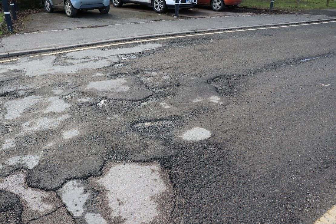 Potholes are causing problems for cars and pedestrians