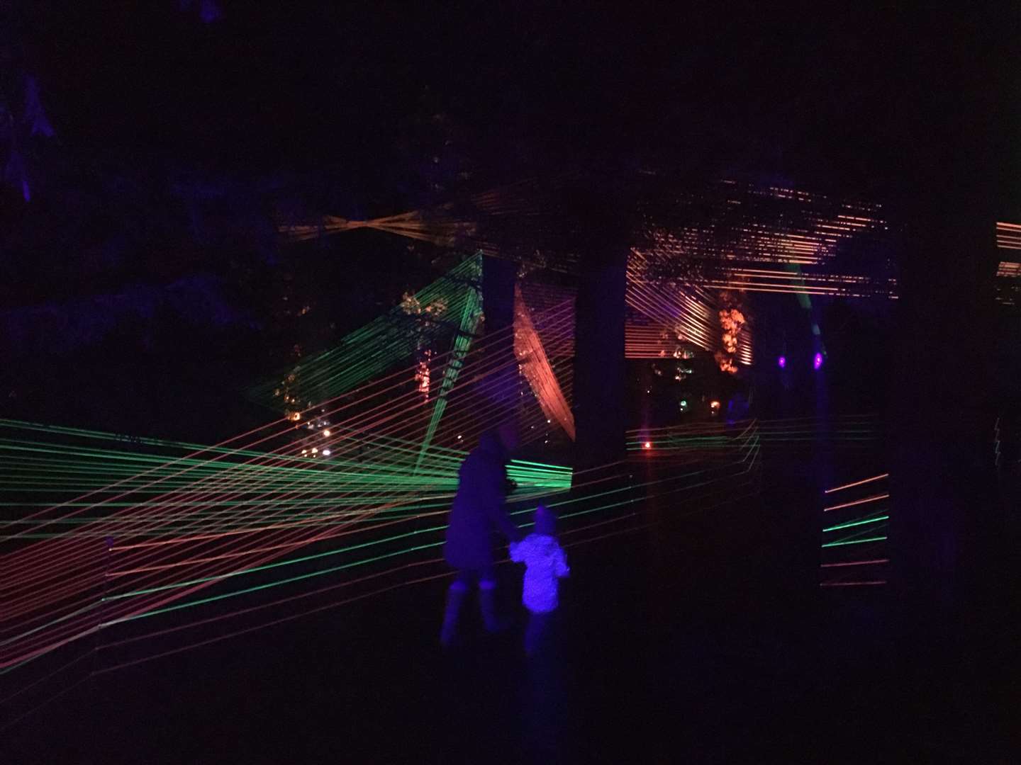 Neon rope lights dazzle at the start of the trail