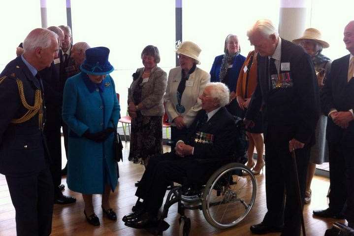 Her Majesty is introduced to a group of surviving airmen who fought in the Battle of Britain