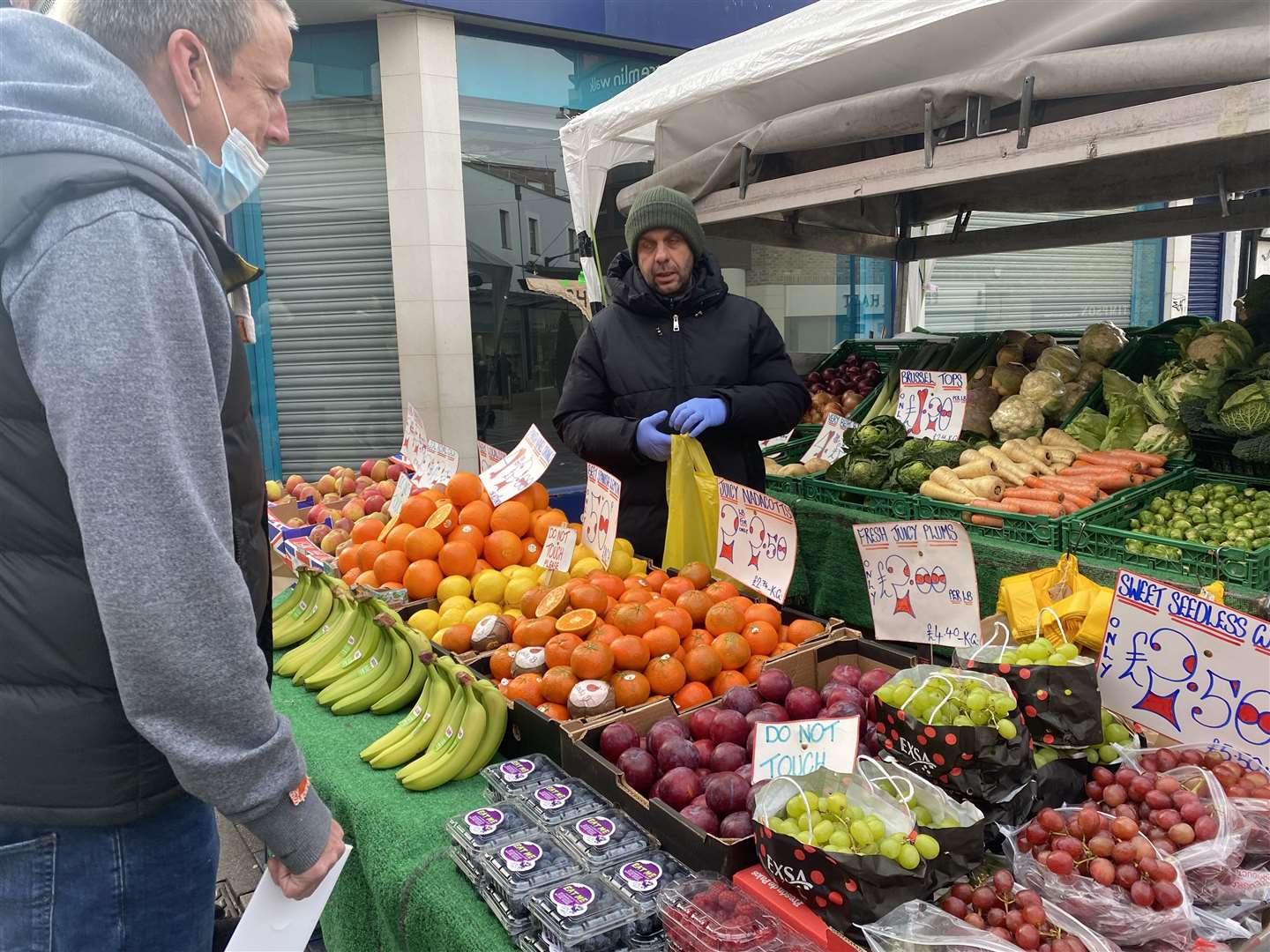 Kris Van Haeften trading at his fruit and veg stall on Week Street