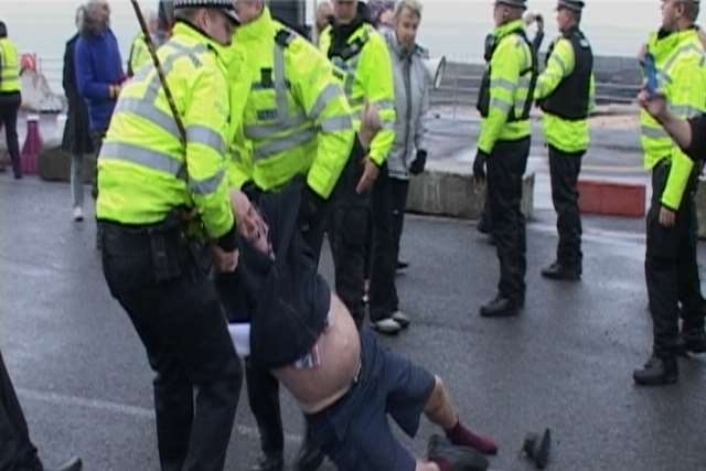A protester being held by police during a previous protest at Ramsgate. Picture: Mike Pett