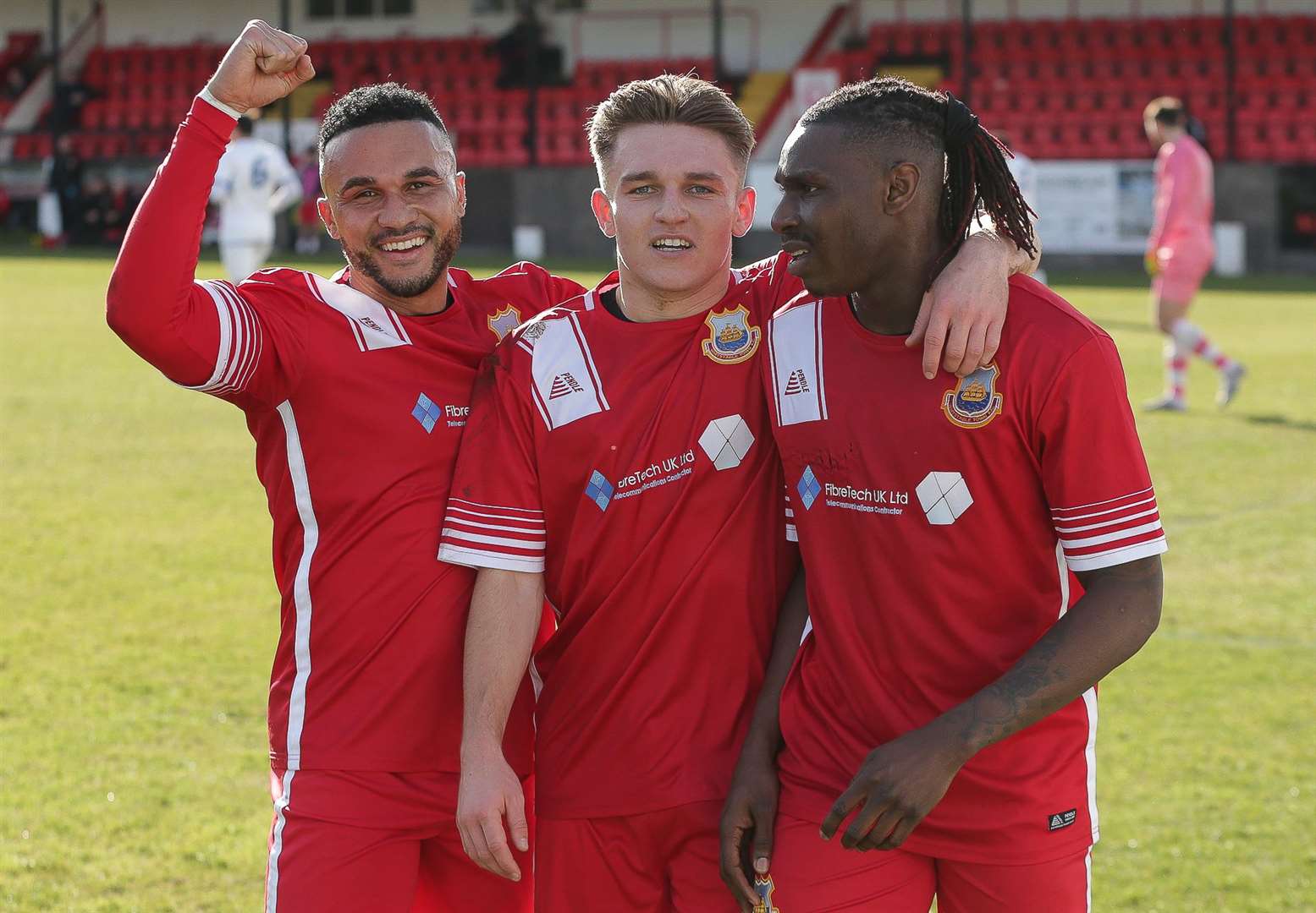 Dean Grant, Josh Oliver and Jefferson Aibangbee celebrate in their 2-1 weekend victory at leaders Erith & Belvedere. Picture: Les Biggs