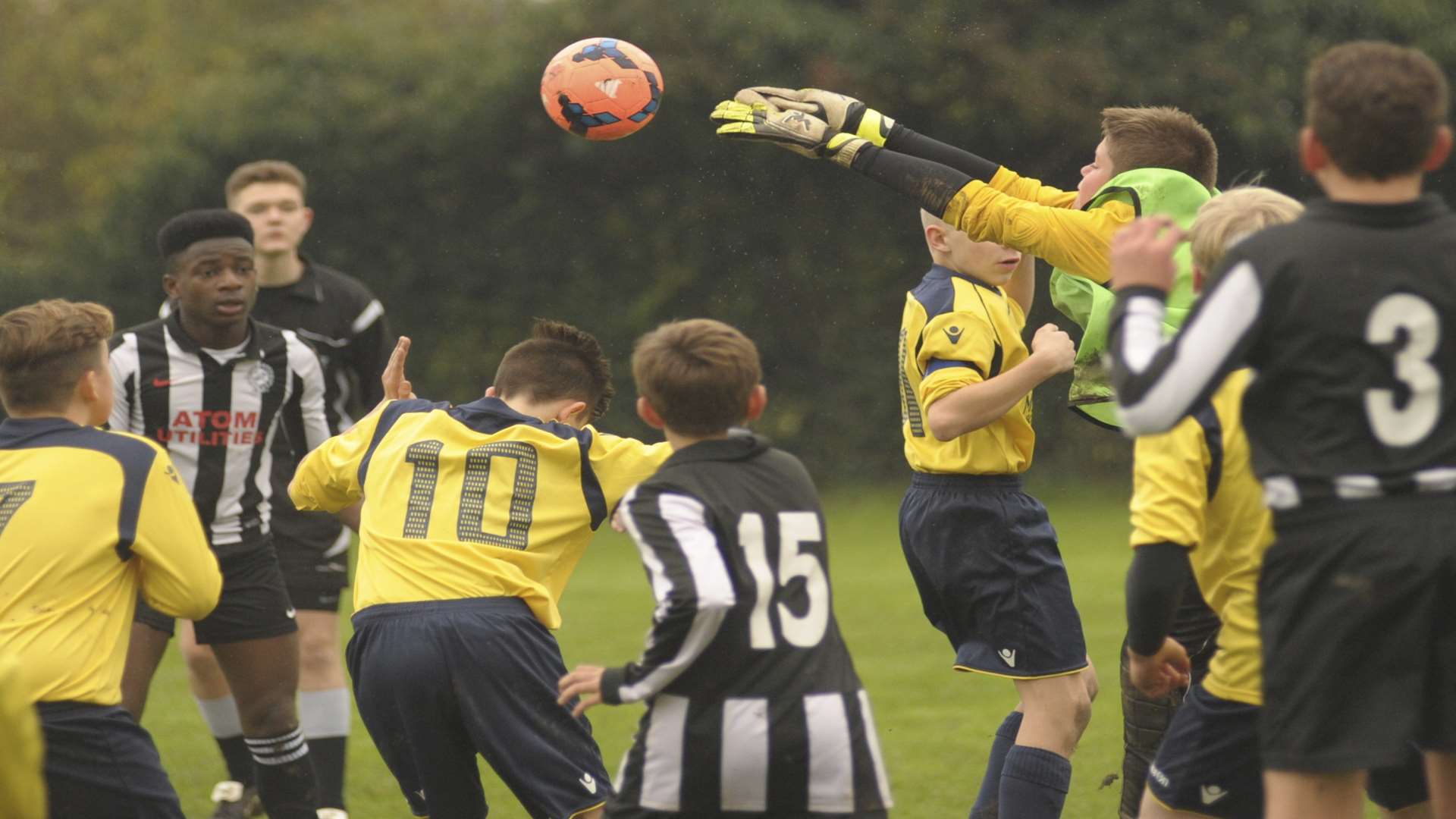 Strood 87, in yellow, up against Real 60 in Under-14 Division 2 Picture: Steve Crispe