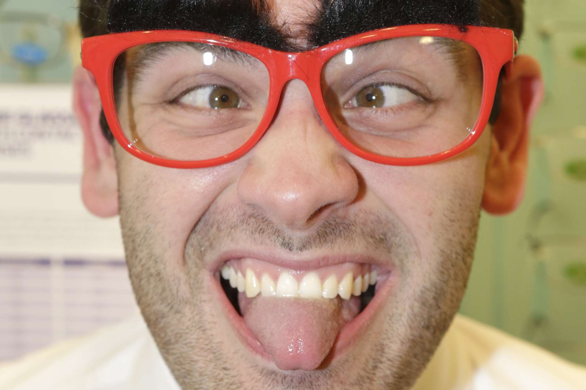 Ed Fox from Specsavers in Maidstone High Street which is selling comedy glasses for Red Nose Day