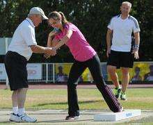 Lisa Dobriskey tries shot put as part of Inspire Kent - coached by Ashford AC's Ted Hawkins
