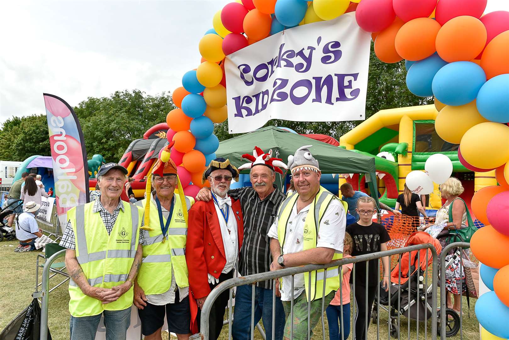 Fraser Gregory, Trevor Moss, Paul Day, John Mansfield and Barry Barnes, part of the Sheerness Cork Lodge raising money on the inflatables for Smile Chain, a cleft palate charity, and Demelza House at the Sheppey Summer Spectacular. Picture: Tony Jones (13768350)