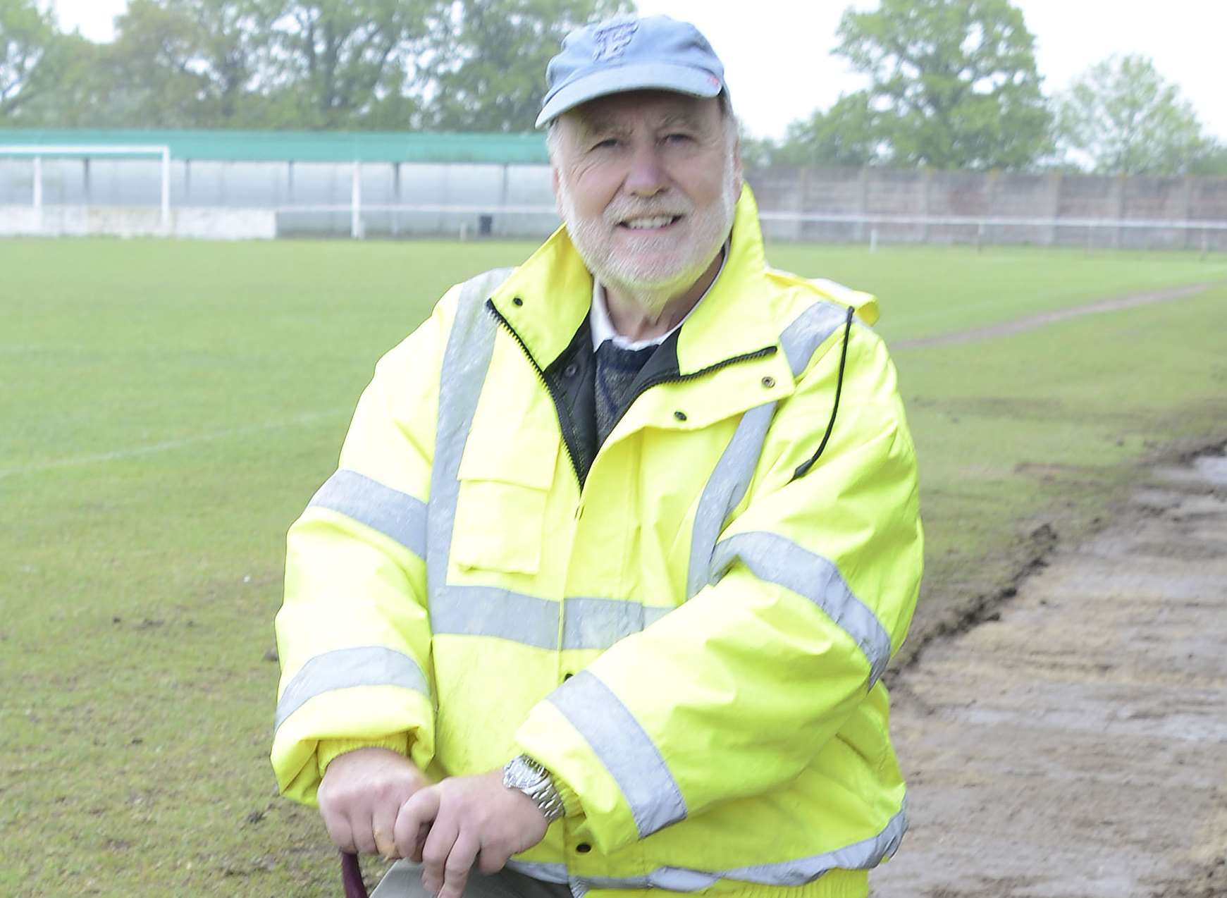 Don Crosbie wields a spade as the old grass pitch at Homelands is dug up in May