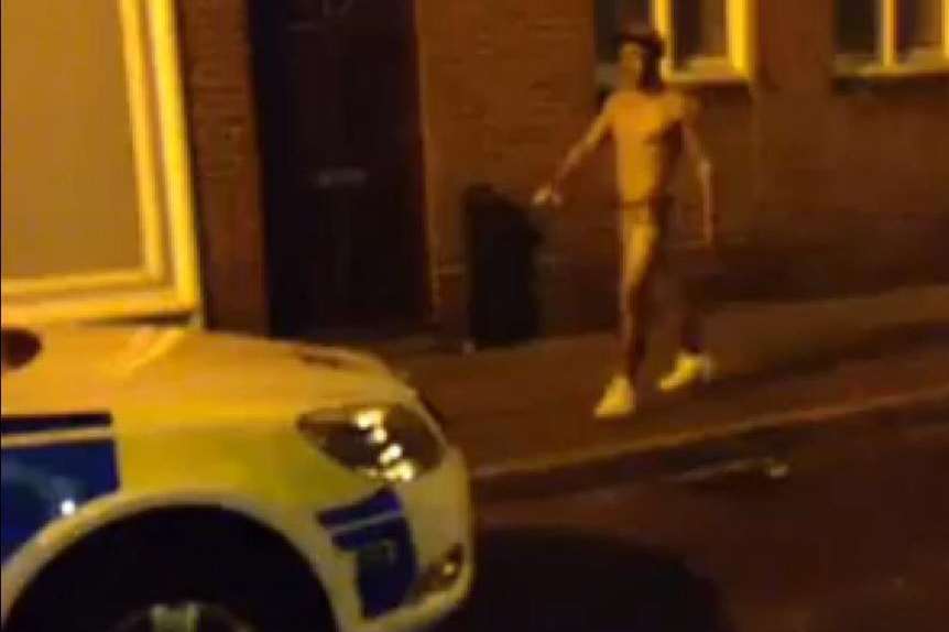 Wearing Speedos past a police car