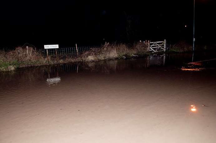 A flooded stretch of The Street in Bearsted on Saturday