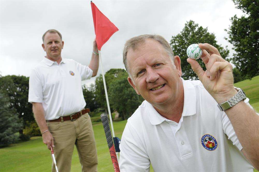 Hole in one golfer Kevin Steele, right, with his twin brother Keith on the 18th hole at Tenterden Golf Club