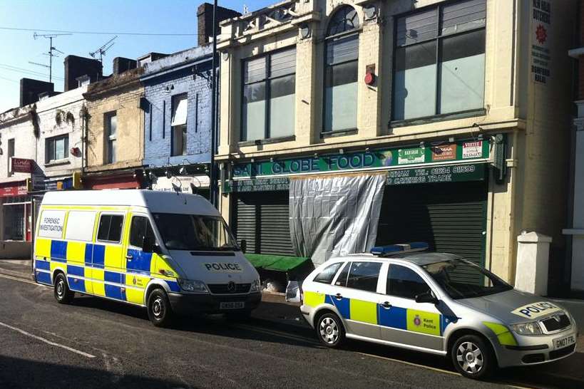 Police outside Sani Globe Food shop in Luton Road, Chatham