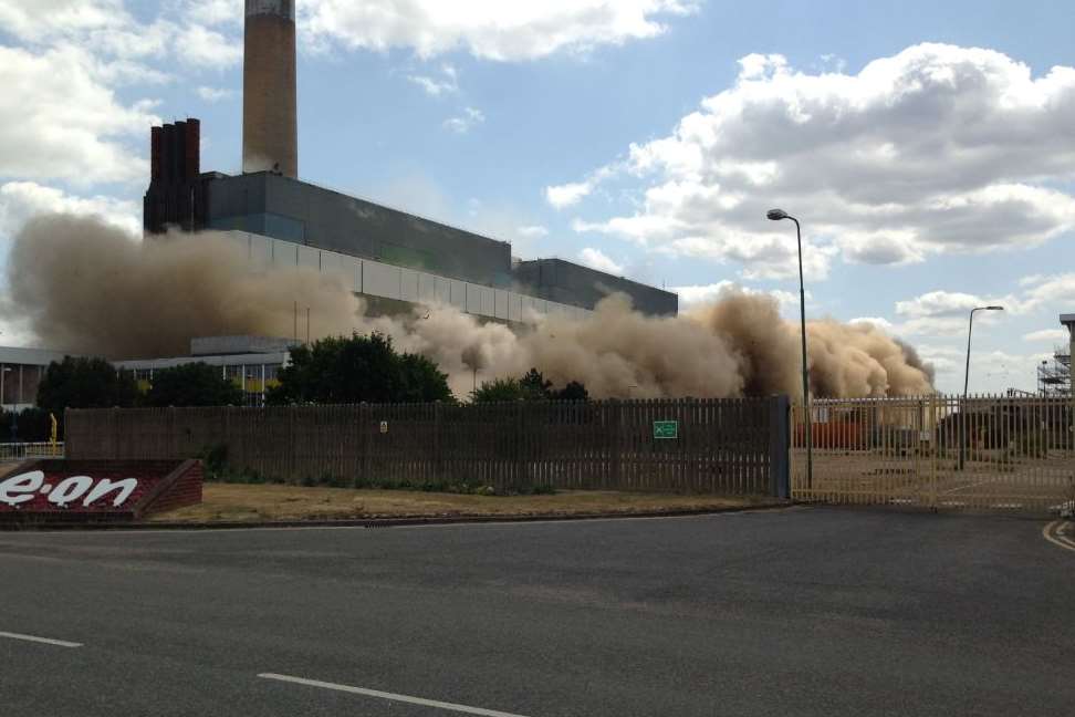 The controlled explosion brings down the power station