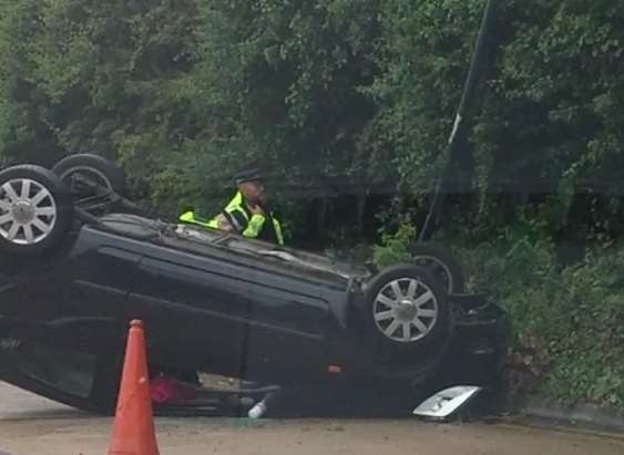 The car overturned after apparently hitting a lamppost in Gillingham. Picture: Michael Allison