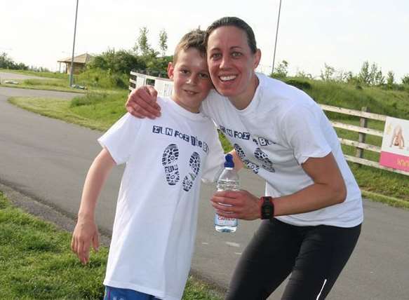 Noah Tucker, aged 10, ran the 5K race with his mum, Lou