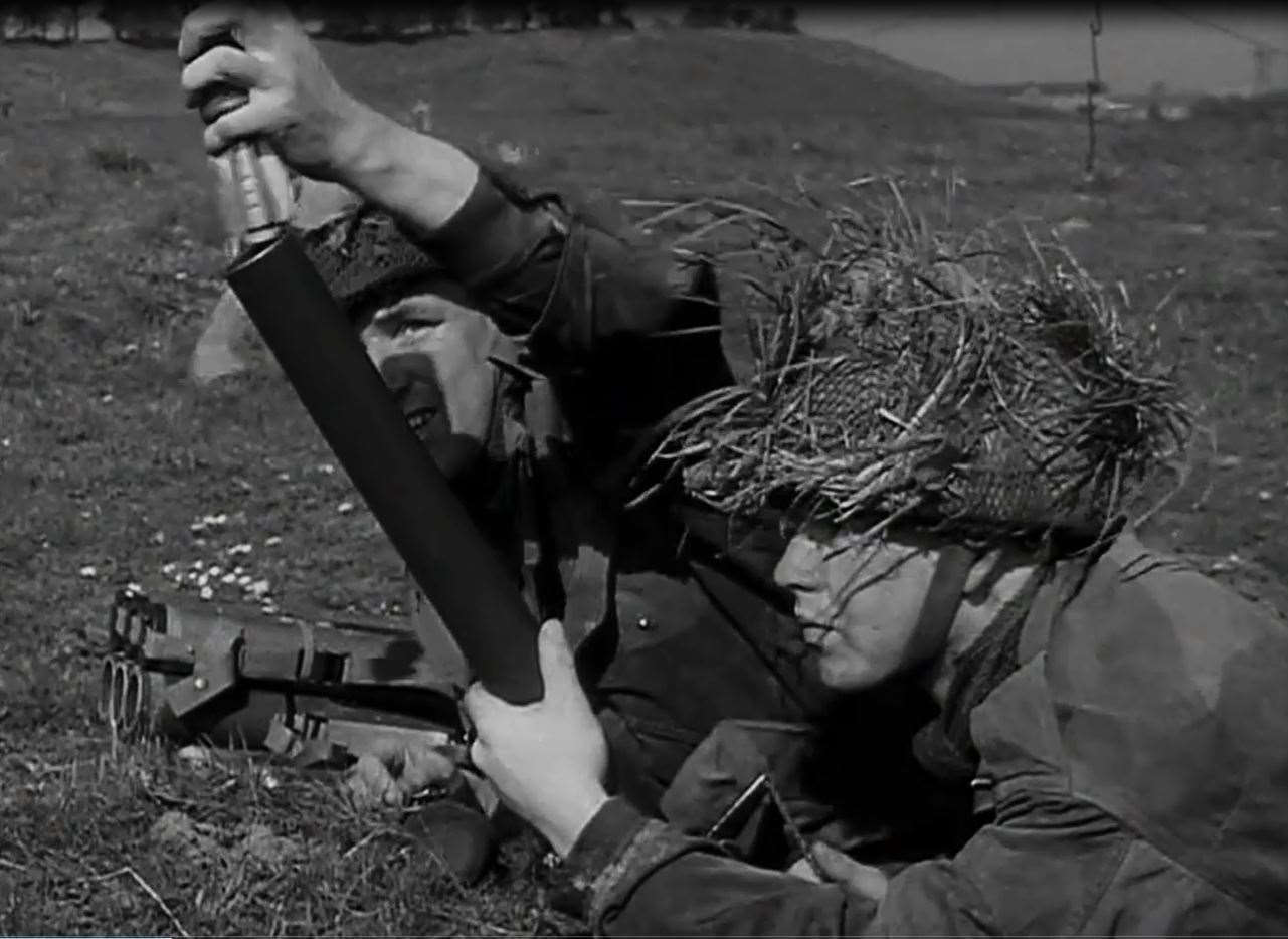 National Servicemen training with a mortar