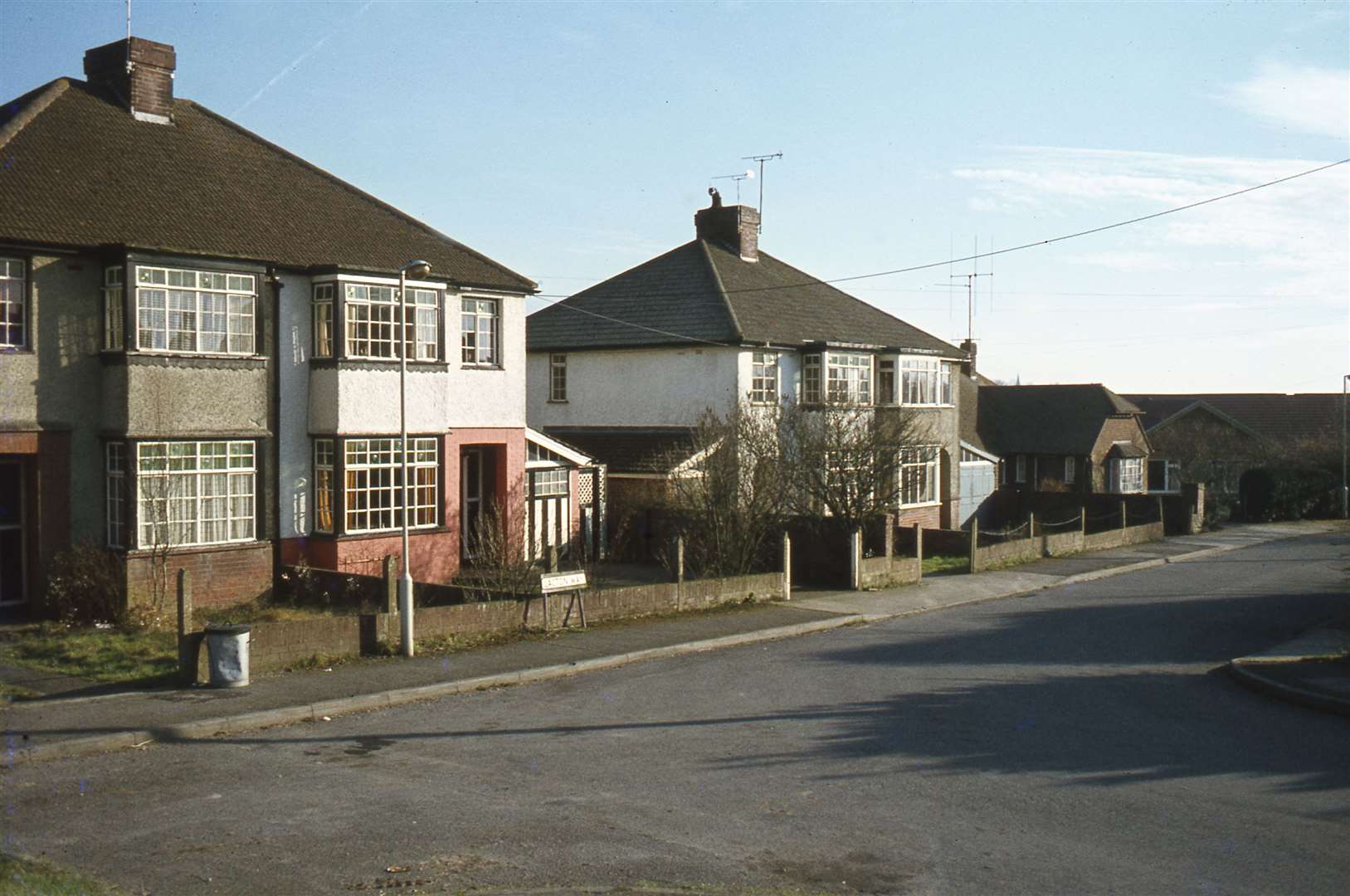 Two of the blighted semi-detached houses in Lacton Way, Willesborough pictured in 1978 and now buried beneath Junction 10. Picture: Neville Marsh