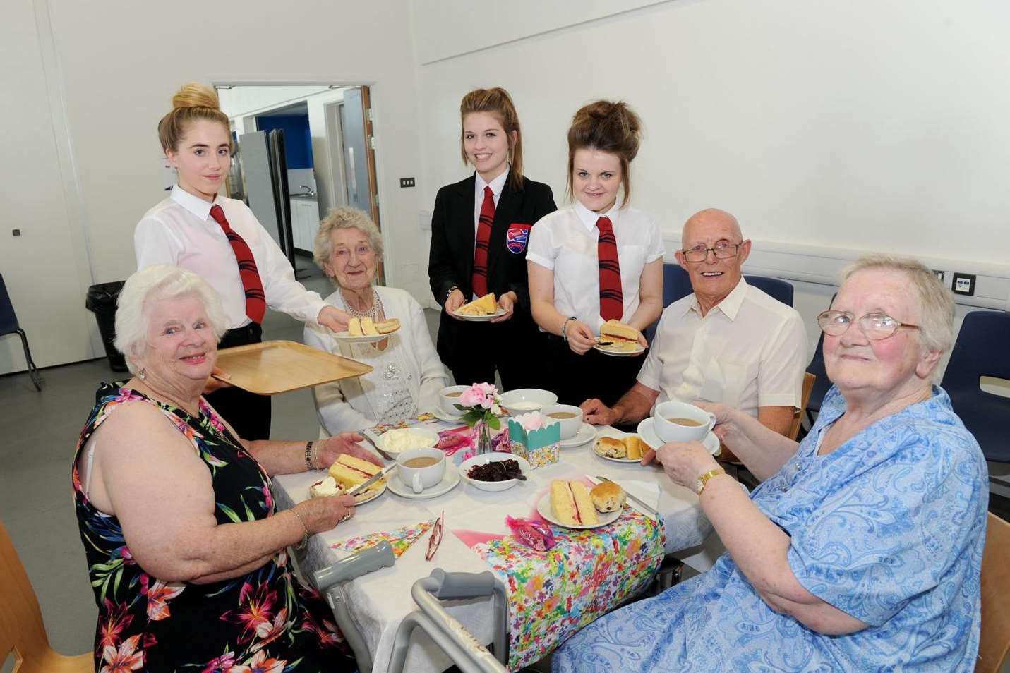 Alfreda Drury, Demi Lambkin 14, Dorothy Pringle, Sophie Parker 14, Gabrielle Morley 14, David Coomber, Julie Lea at the tea party