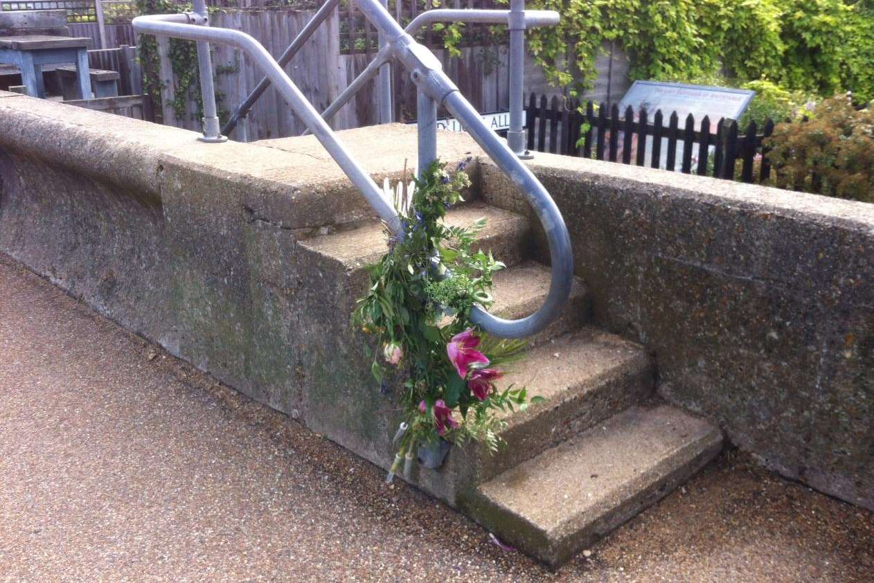 Flowers have been left at the scene of the man's death in Whitstable