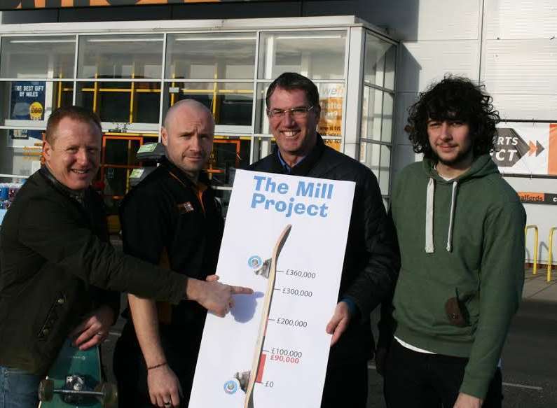Dave Green, mentor of The Mill project, Steve Wietetha, deputy manager of Halfords, Cllr Mike Whiting and Jordan Rogers, chairman