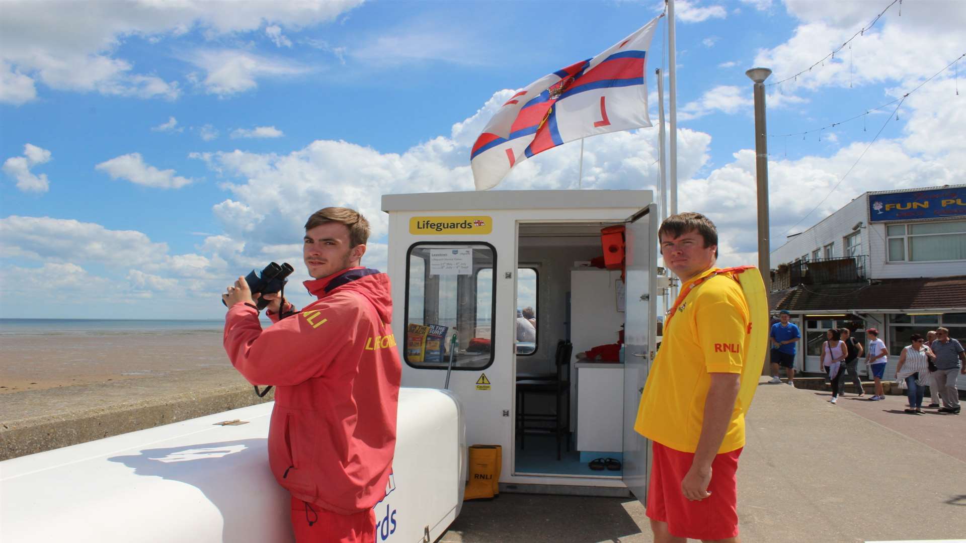 Lifeguards Jamie Hopper and George Rose on duty at Leysdown. Stock photo.
