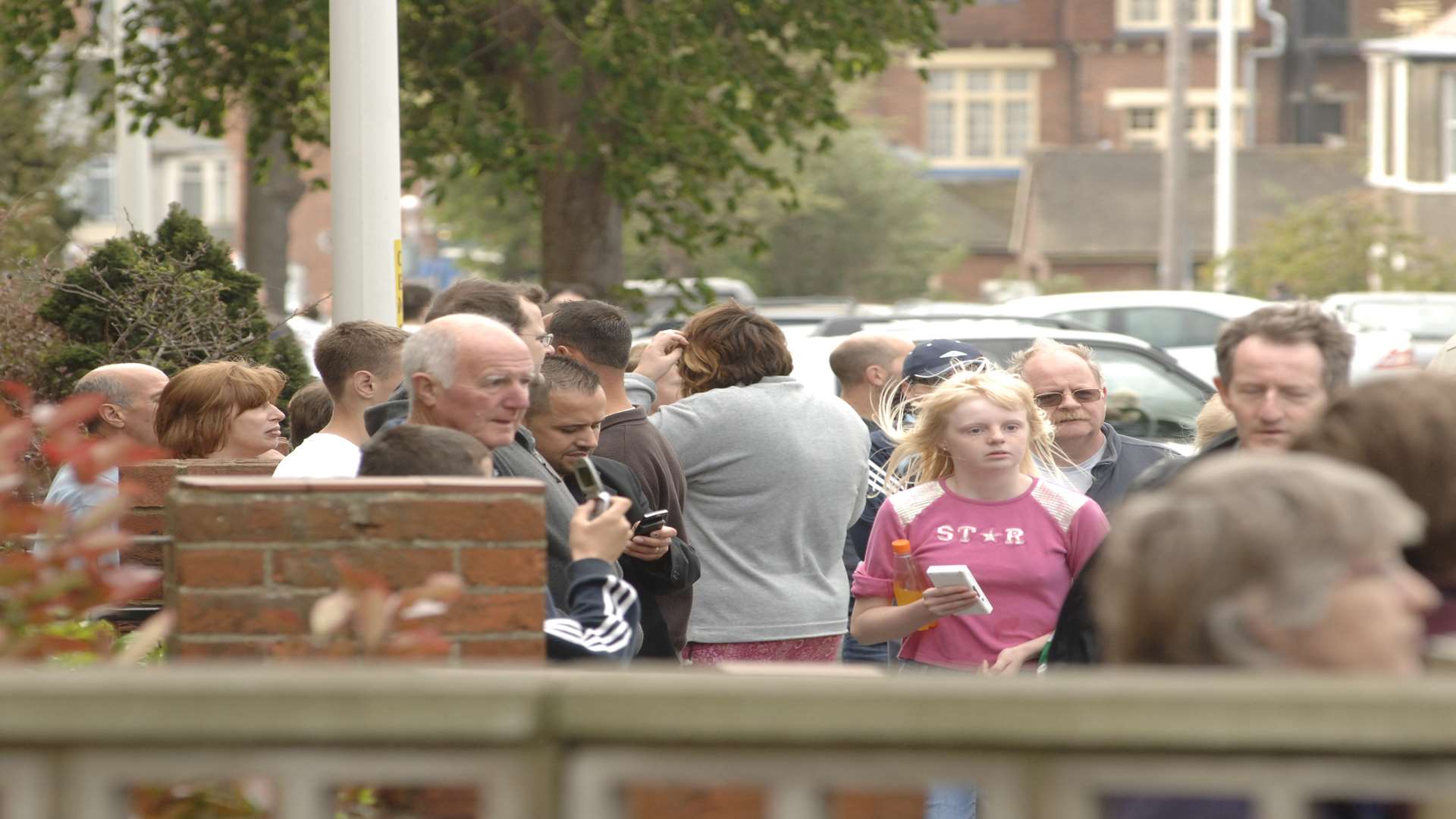 People gathered in the street after their homes shook. Picture: Paul Dennis