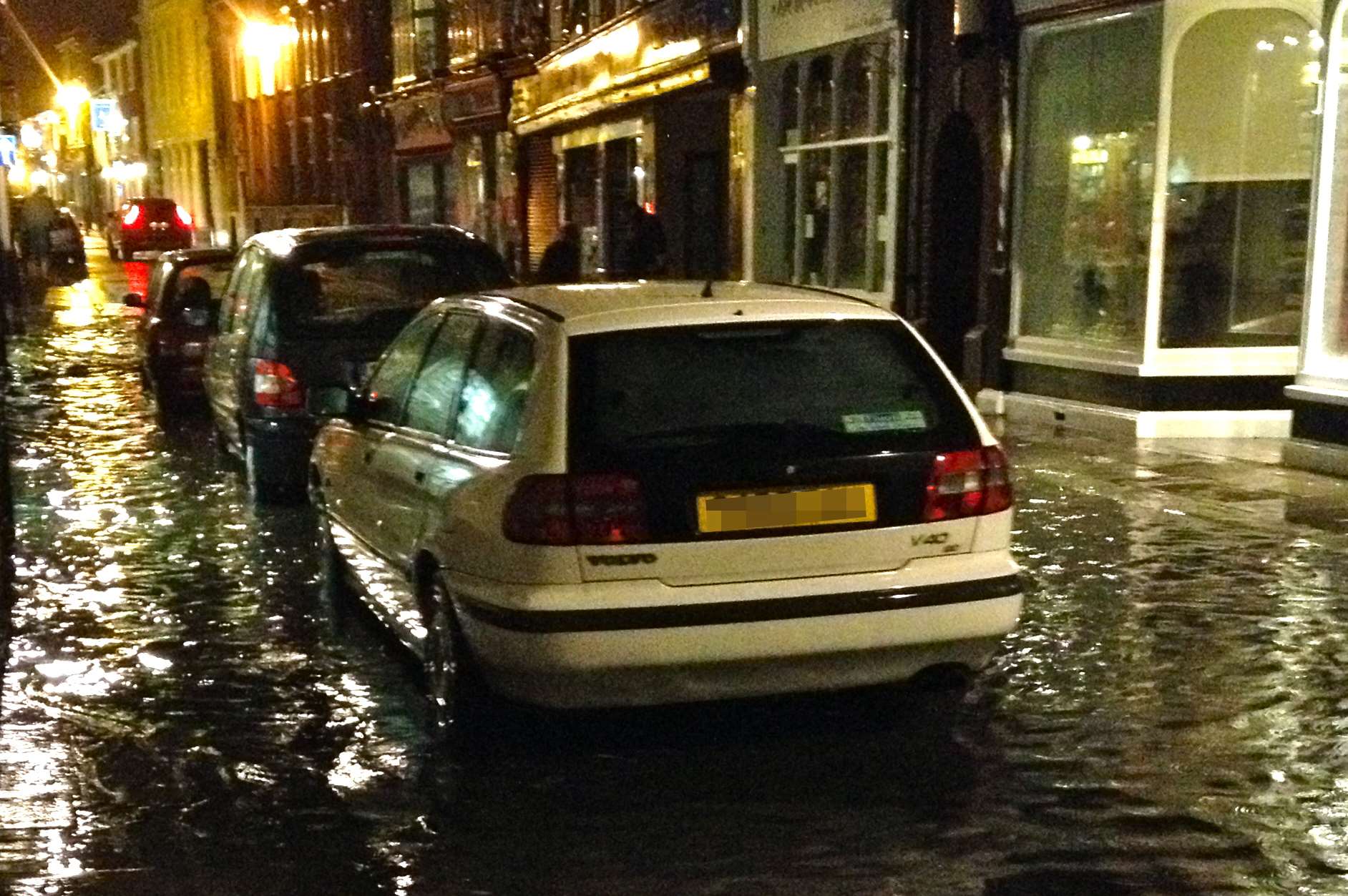 Cars in flooded Hythe High Street. Picture: Kay McLoughlin
