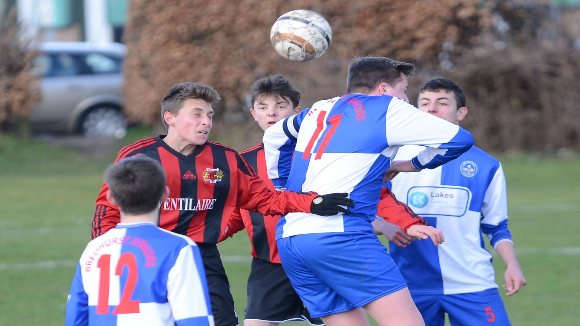 Woodcoombe Youth under-15s, in red, and Bredhurst Juniors fight for Division 1 points Picture: Gary Browne