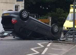The car overturned in Dymchurch Road, Hythe. Picture: Glenn Bryant