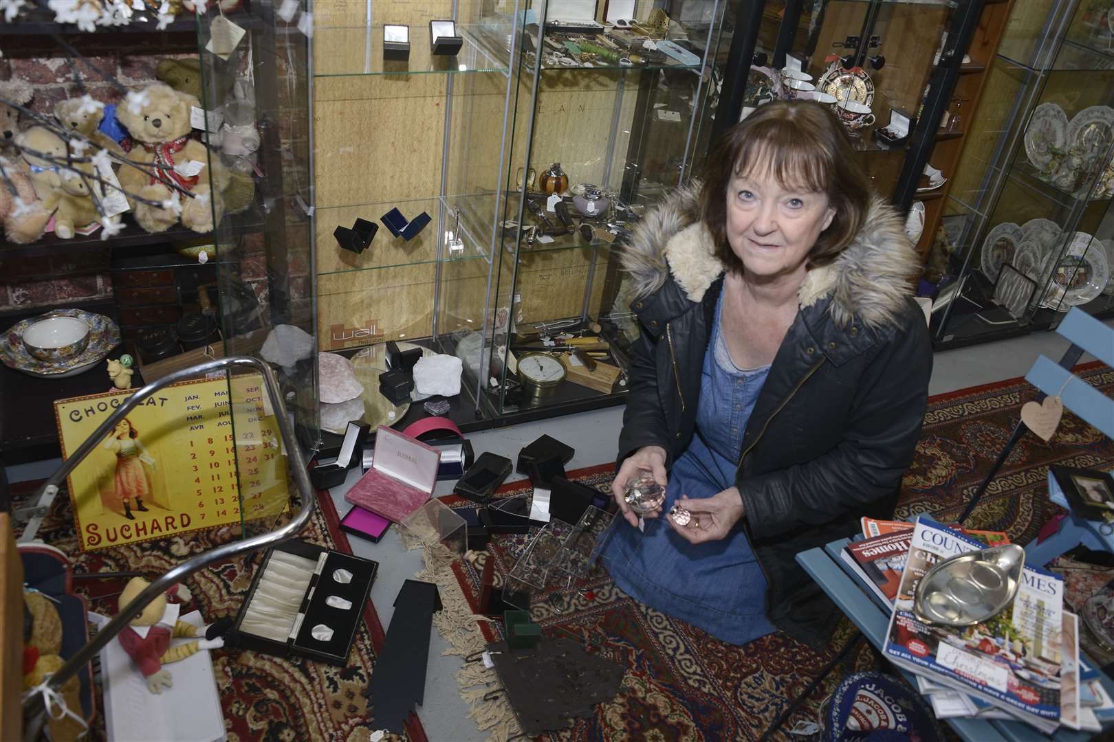 Wendy Pursglove clears up after the raid at Old Ebony Antiques and Collectables