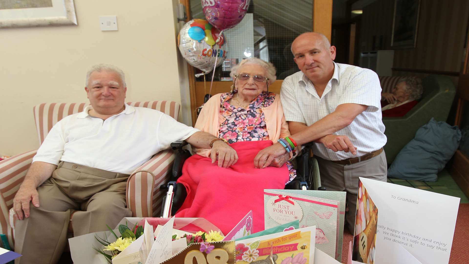 Vera with her son Graham Pigott (left) and grandson Kevin Lee (right) on her 110th birthday last year