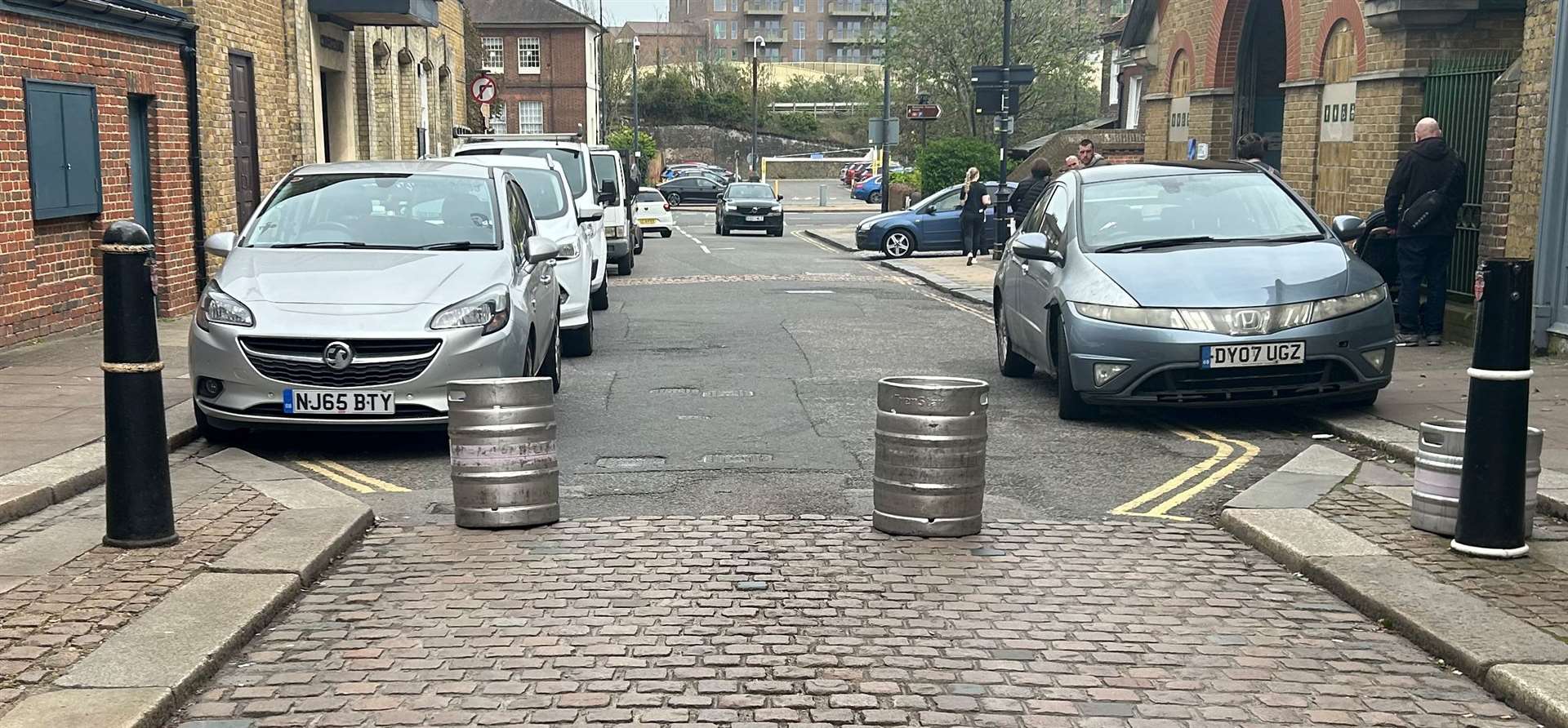 Beer kegs put up to stop motorists driving across Rochester High Street