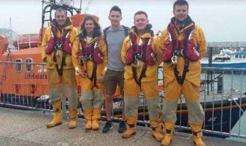 Kevin Hart with members of the Dover RNLI, who he is raising money for. Picture: Alan Hollands