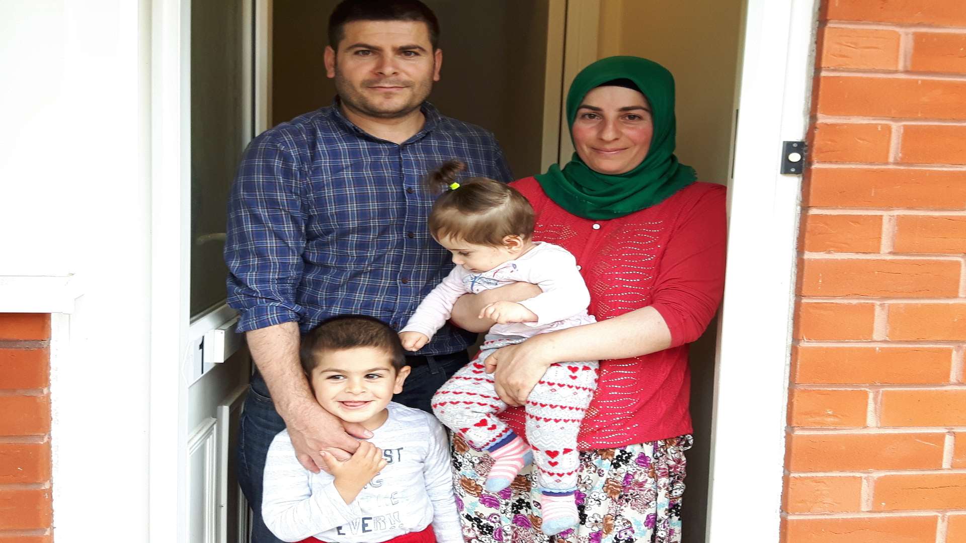 Ismail Darioglu with wife Leyla and their children Yunus and Kubra