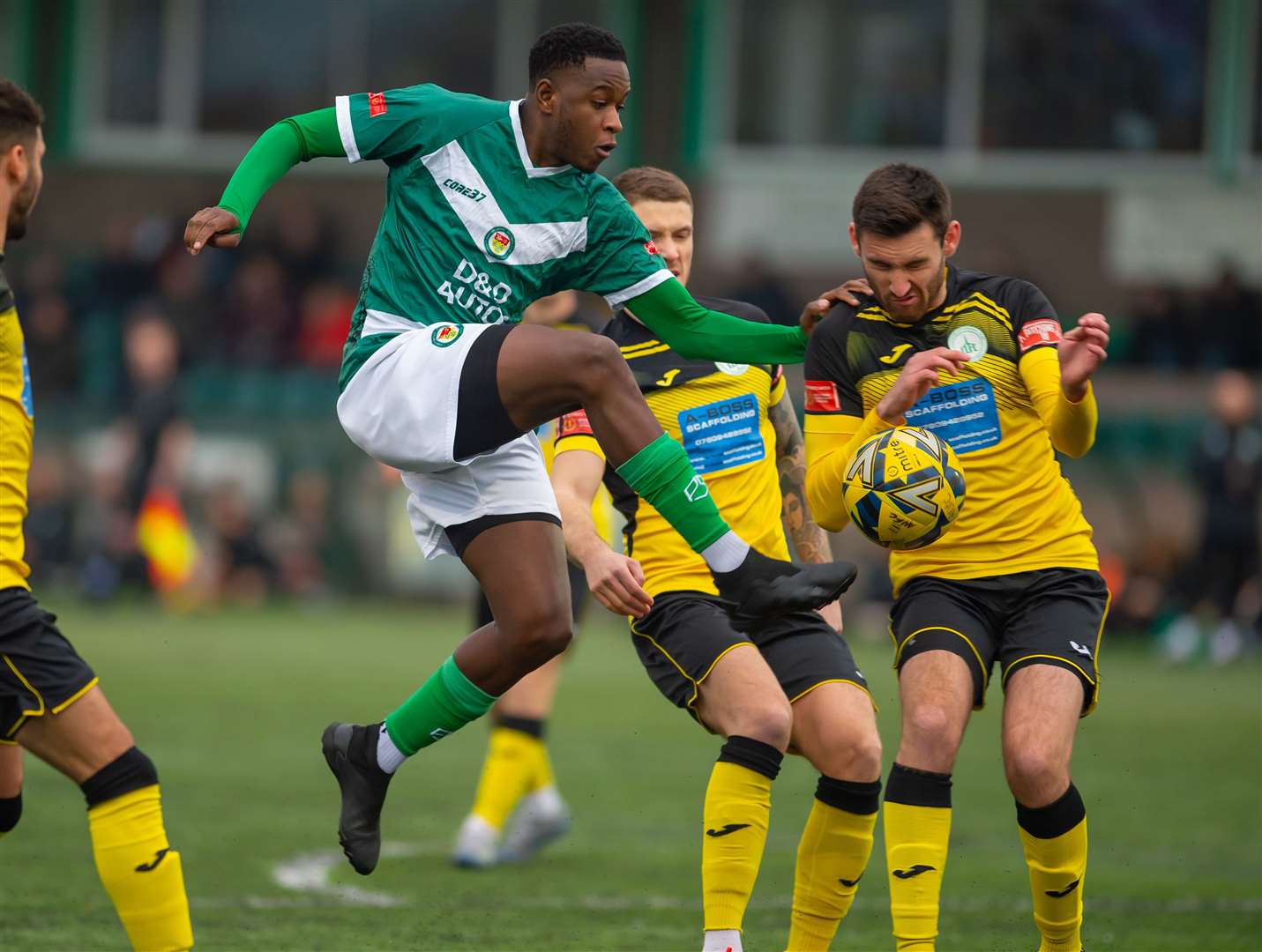 Omarr Lawson makes progress in midfield for Ashford. Picture: Ian Scammell